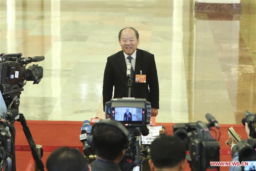 Ministers receive interview after 3rd plenary meeting of 2nd session of 13th NPC