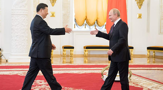 China, Russia agree to upgrade relations for new era