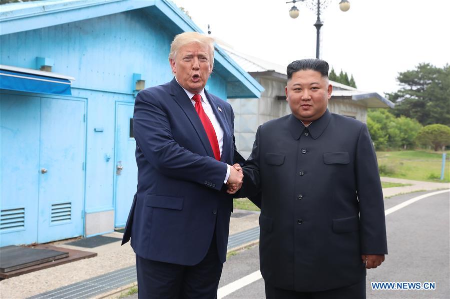 U.S. President Donald Trump meets with Kim Jong Un, top leader of the Democratic People's Republic of Korea (DPRK), in the inter-Korean border village of Panmunjom on June 30, 2019. (Xinhua/NEWSIS)