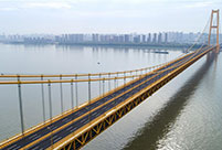 World's longest double-deck suspension bridge opens to traffic