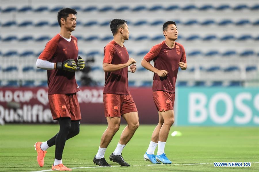 Players of China and Syria attend training sessions before group A match