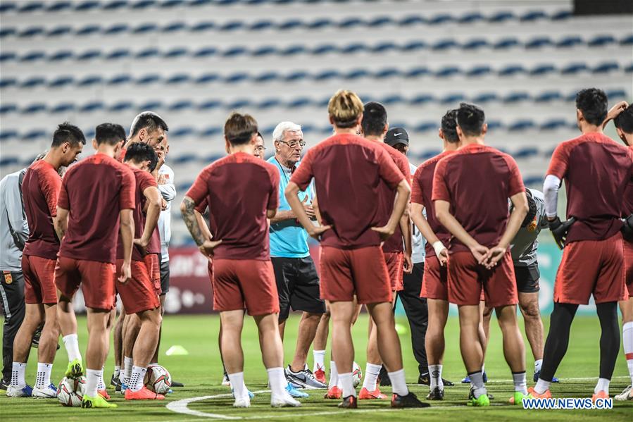 Players of China and Syria attend training sessions before group A match