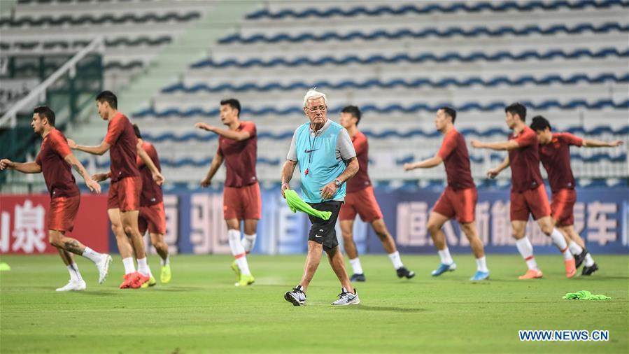 Players of China and Syria attend training sessions before group A match