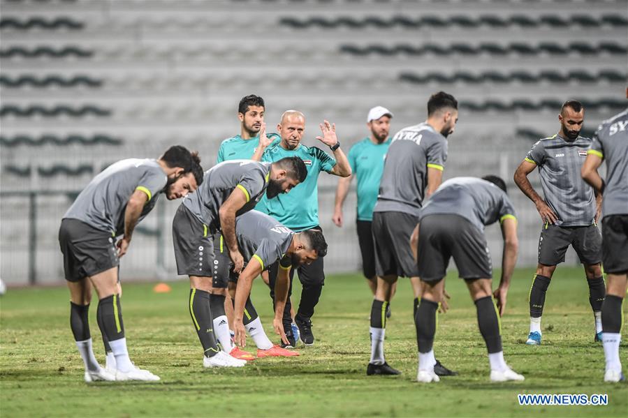 Players of China and Syria attend training sessions before group A match