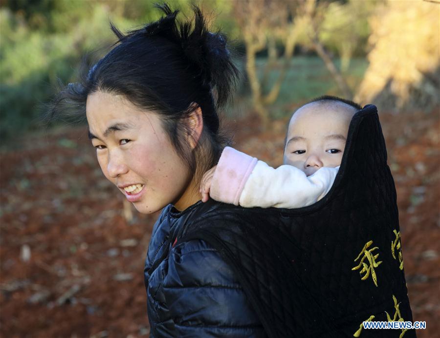 Villagers busy with farm work in SW China's Yunnan