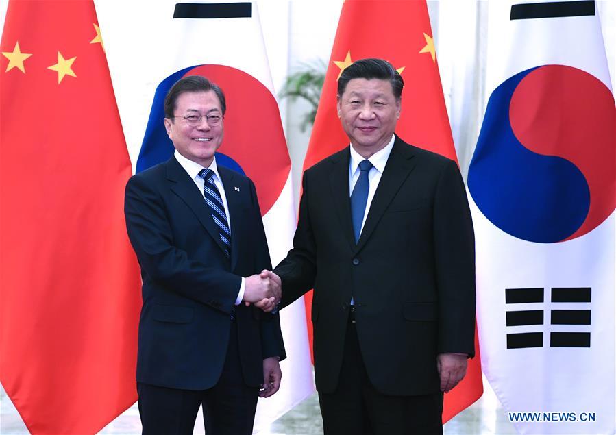 Chinese President Xi Jinping meets with President of the Republic of Korea (ROK) Moon Jae-in at the Great Hall of the People in Beijing, capital of China, Dec. 23, 2019. (Xinhua/Rao Aimin)