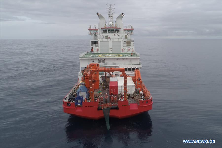 China's 36th Antarctic expedition team work on icebreaker Xuelong 2