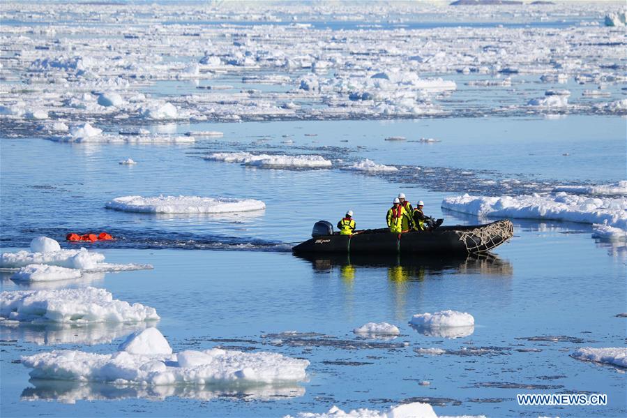 China's 36th Antarctic expedition team work on icebreaker Xuelong 2