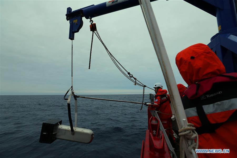 China's 36th Antarctic expedition team work on icebreaker Xuelong 2