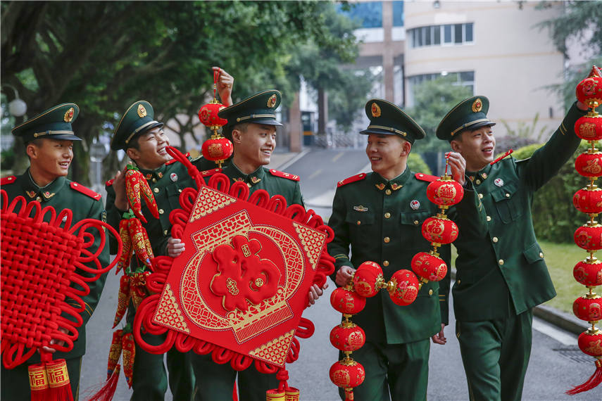 People's Armed Police soldiers decorate barracks to celebrate Chinese New Year