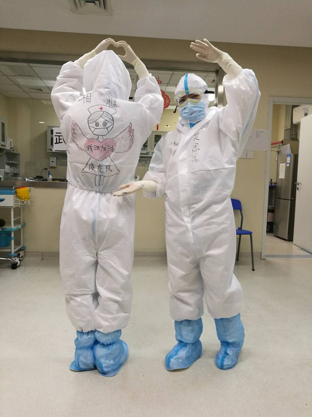 Post-90s frontline nurse draws on colleagues’ protective suits to boost morale