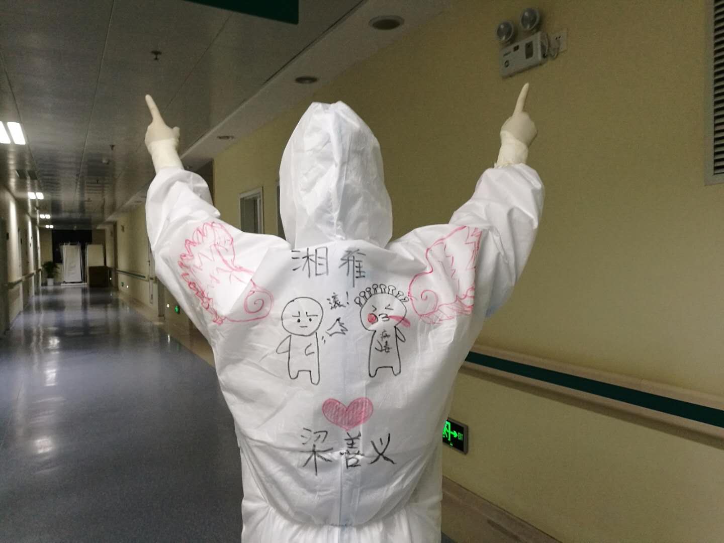 Post-90s frontline nurse draws on colleagues’ protective suits to boost morale