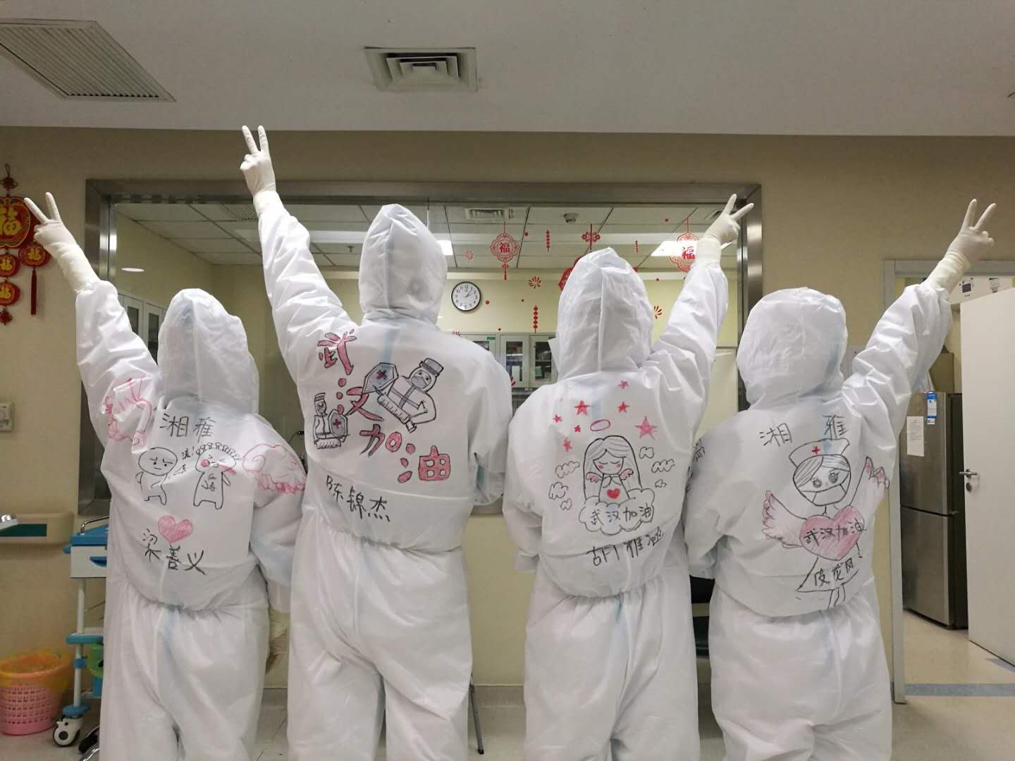 Post-90s frontline nurse draws on colleagues’ protective suits to boost morale