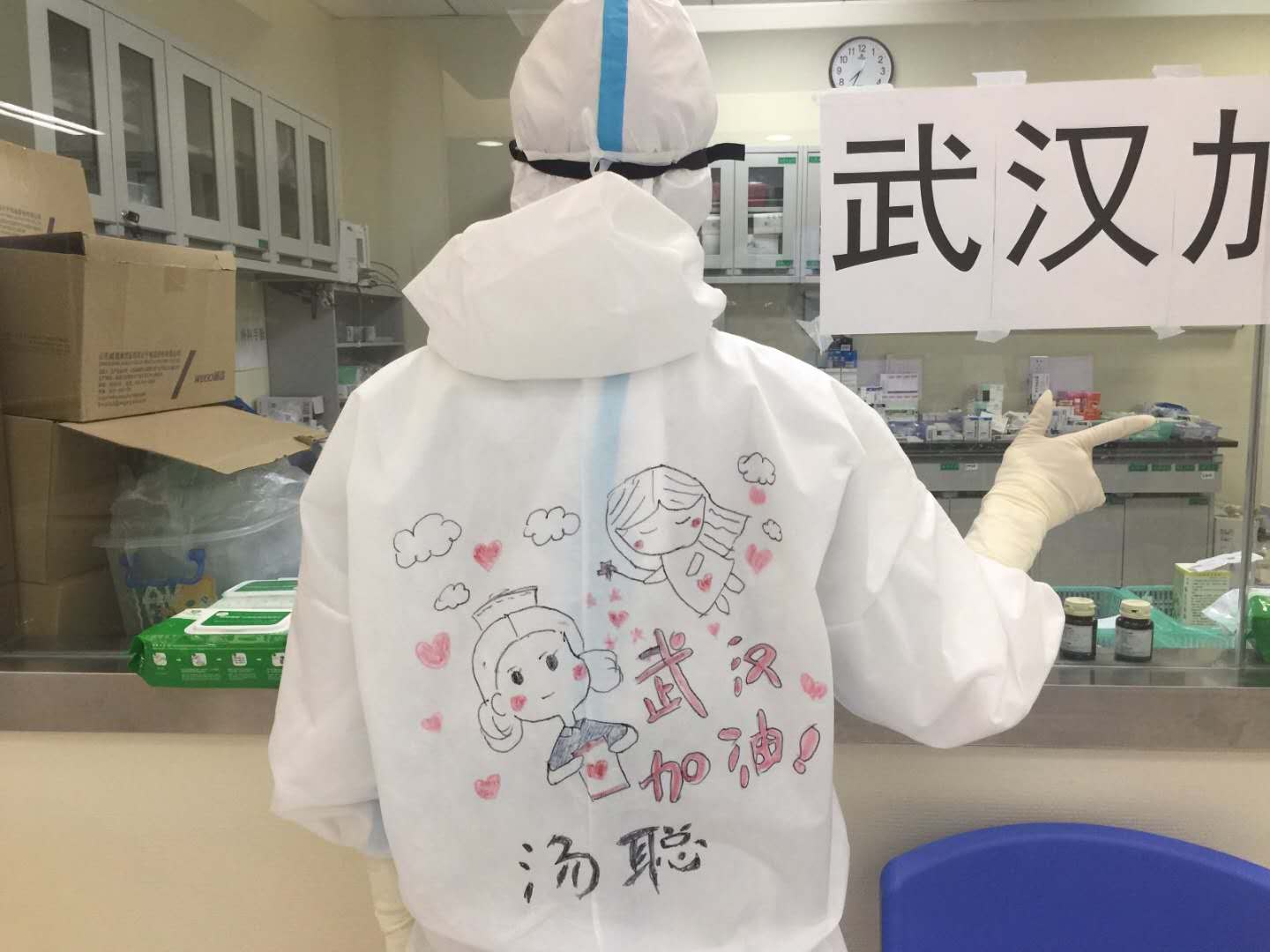 Post-90s frontline nurse draws on colleagues’ protective suits to boost morale