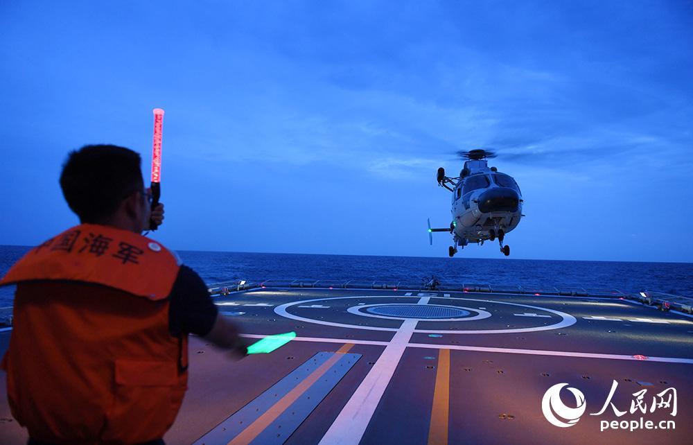 Chinese naval escort fleet conducts round-the-clock flight training