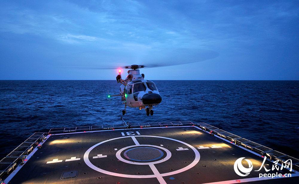 Chinese naval escort fleet conducts round-the-clock flight training