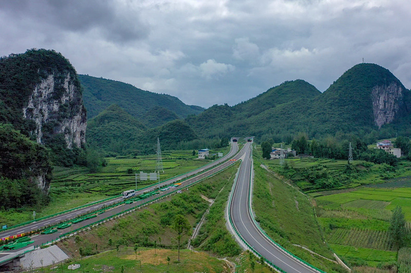 Winding mountain paths in central China's Hubei emerge as broad roads