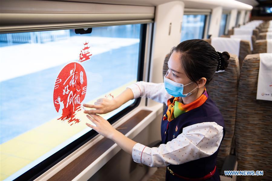 National Day, Mid-Autumn Festival celebrated on Fuxing bullet train