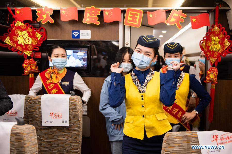 National Day, Mid-Autumn Festival celebrated on Fuxing bullet train