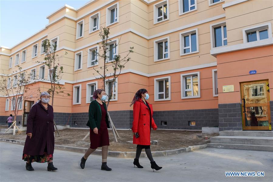 Construction work of 20 residential buildings completed in Axili, Xinjiang