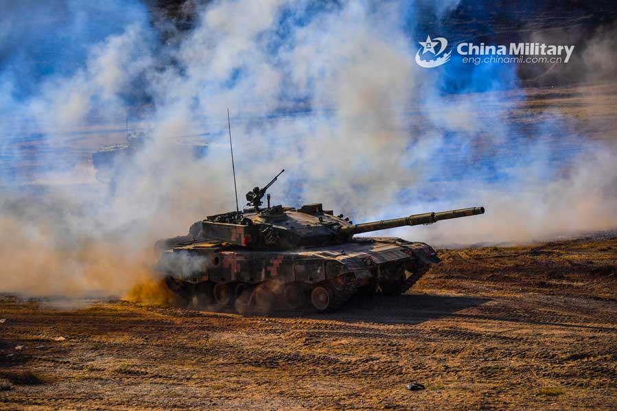 Tanks fire towards simulated enemies