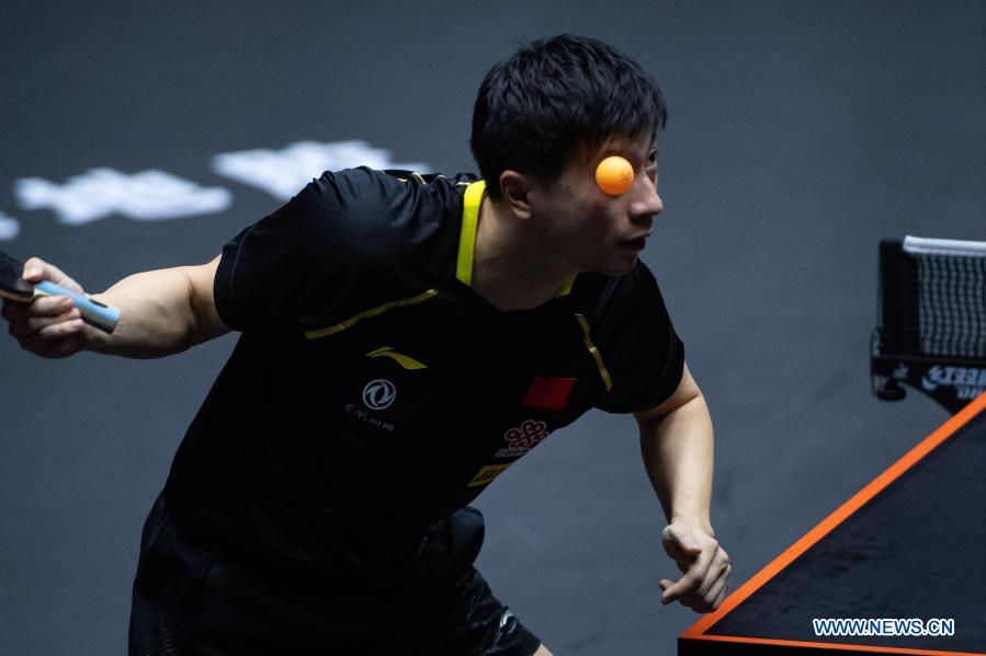 Ma Long of China serves the ball during the men's singles semifinals against Lin Gaoyuan of China at World Table Tennis (WTT) Macao 2020 Tournament in Macao, south China, Nov. 28, 2020. (Xinhua/Cheong Kam Ka)