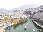 Beijing's Gubei Water Town ushers in first snowfall of winter