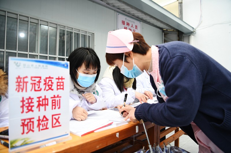 China's COVID-19 vaccination tops 9 million