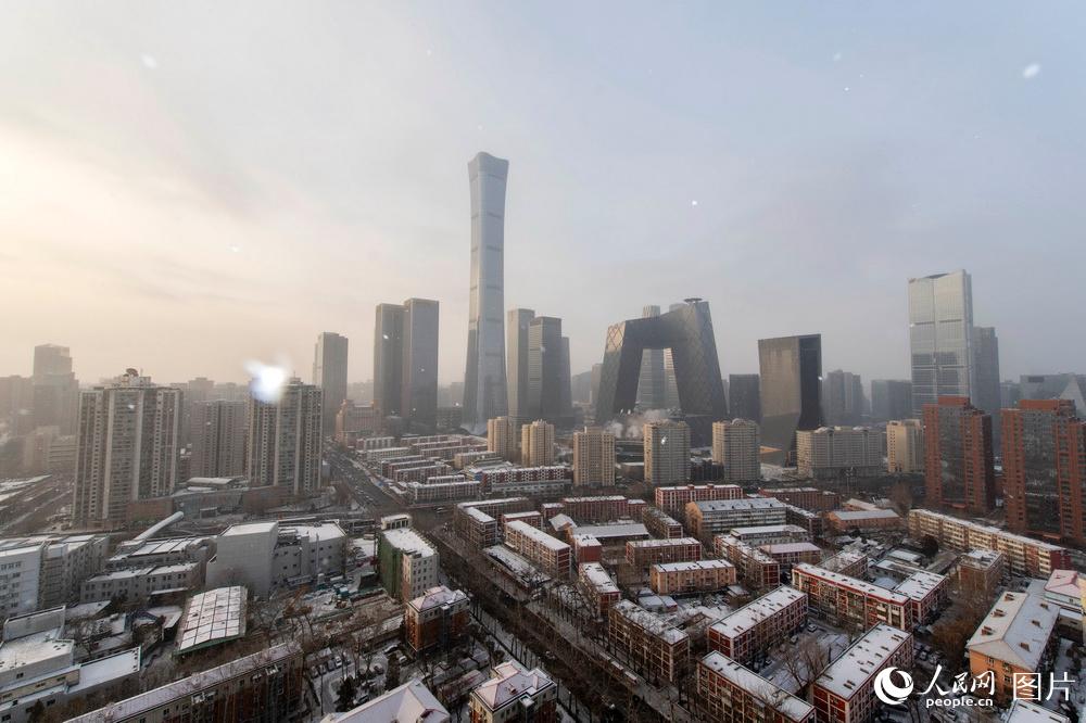 Beijing embraces first snow of 2021