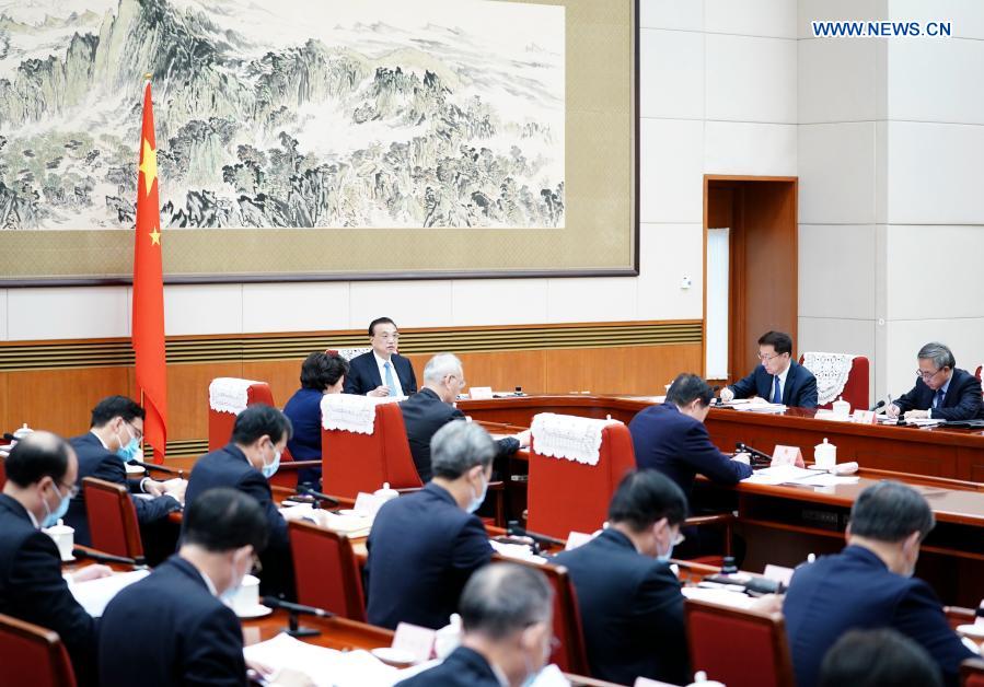 China's cabinet discusses draft gov't work report, 14th Five-Year Plan