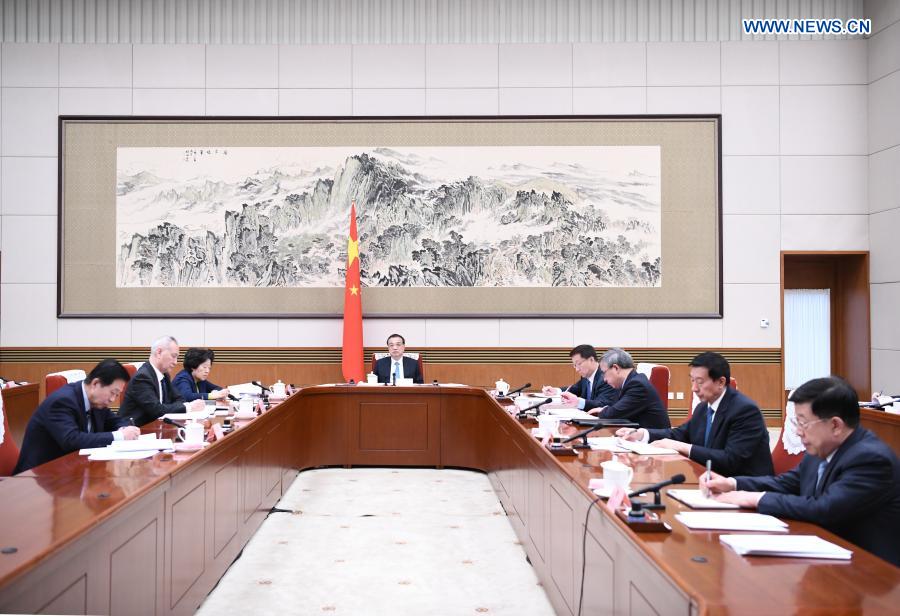 China's cabinet discusses draft gov't work report, 14th Five-Year Plan