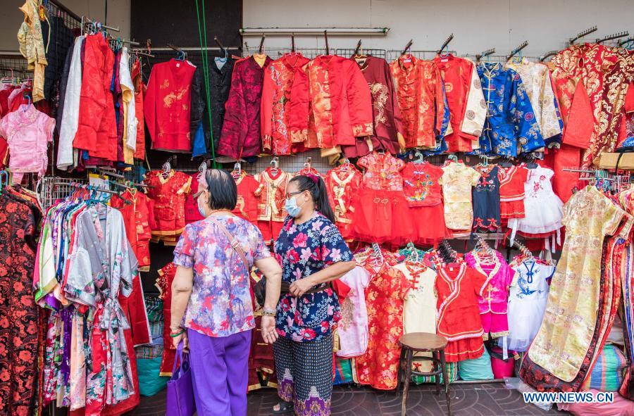 People buy spring couplets and other decorations for upcoming Chinese Lunar New Year in Bangkok