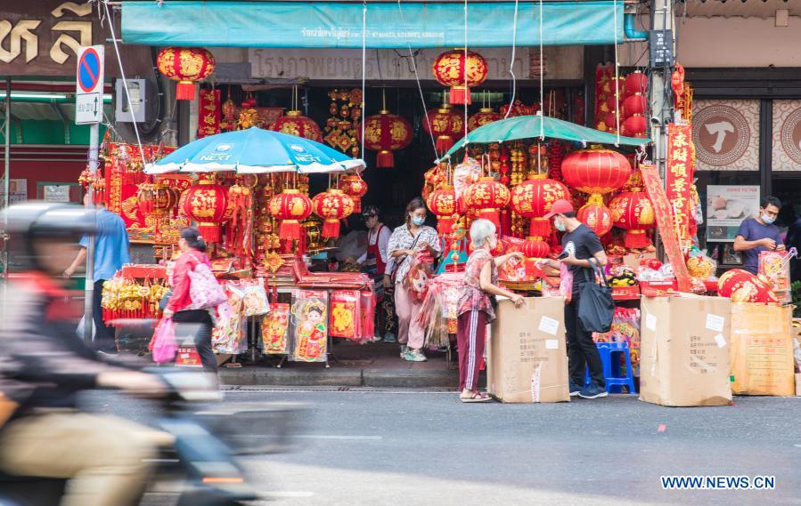 People buy spring couplets and other decorations for upcoming Chinese Lunar New Year in Bangkok