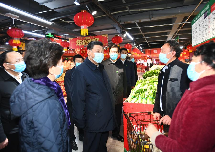 Chinese President Xi Jinping, also general secretary of the Communist Party of China Central Committee and chairman of the Central Military Commission, checks the supply of goods for the Spring Festival holiday and their prices at a supermarket in Guanshanhu District of Guiyang, capital of southwest China’s Guizhou Province, Feb. 4, 2021. Xi on Thursday visited a supermarket and a residential community in Guiyang. (Xinhua/Xie Huanchi)