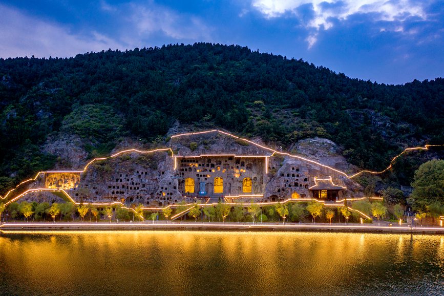 Grottoes in central China welcome vistors at dusk