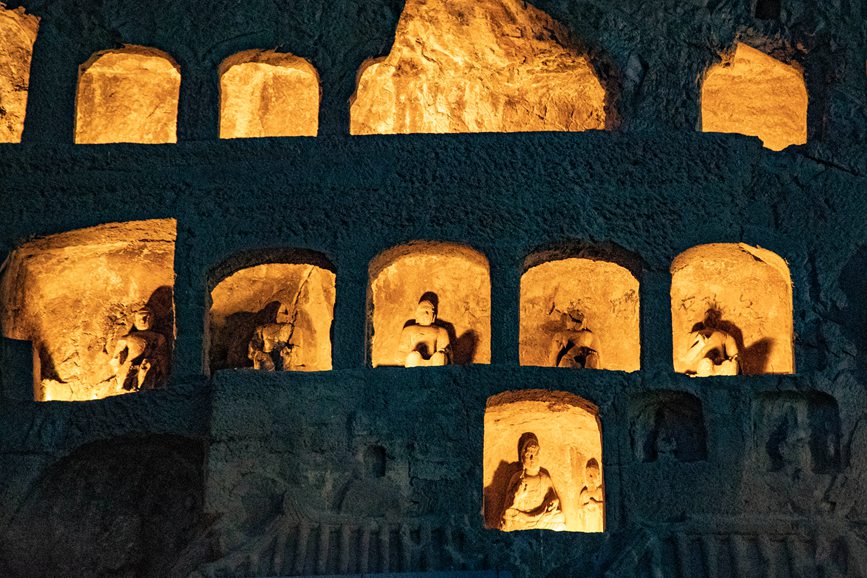 Grottoes in central China welcome vistors at dusk