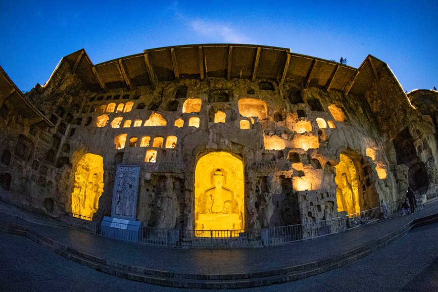 Grottoes in central China welcome vistors at dusk