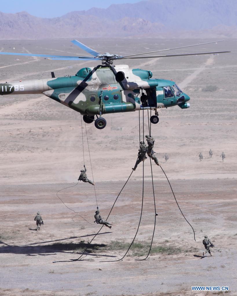 Chinese, Russian military personnel conduct adaptive training for joint military drill