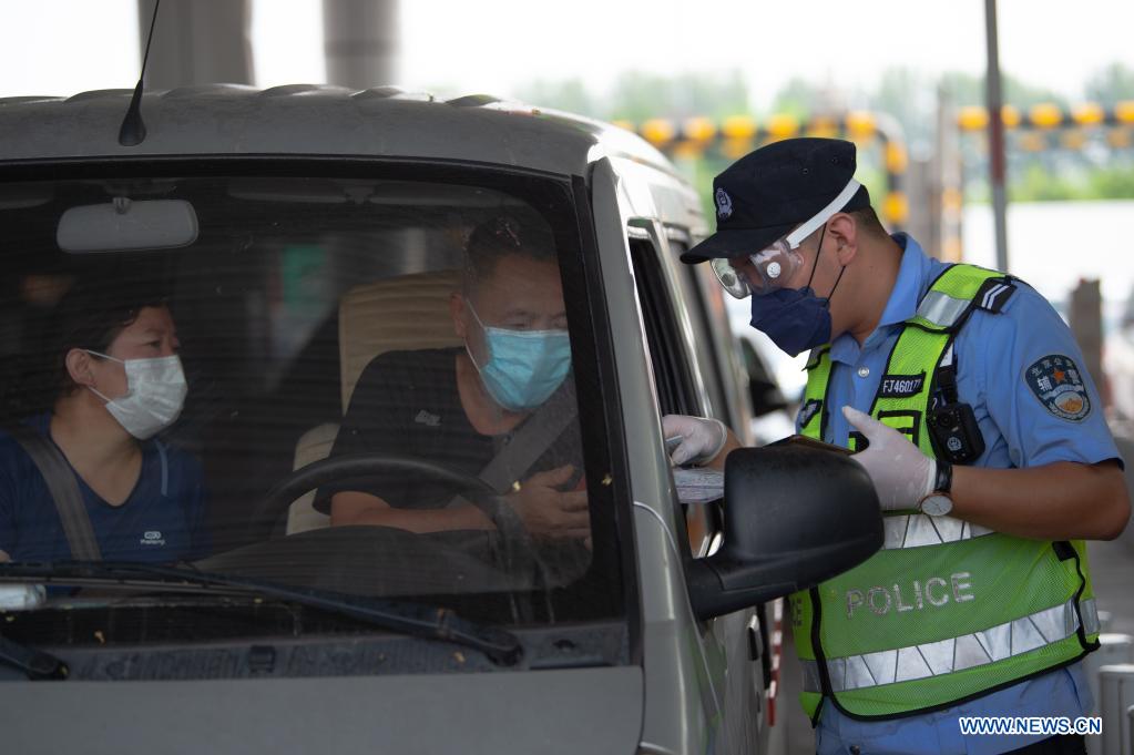 Beijing steps up screening of inbound passengers from areas with reported COVID-19 cases