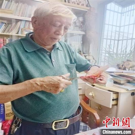 90-year-old man makes paper cutouts of 4,000-plus butterflies