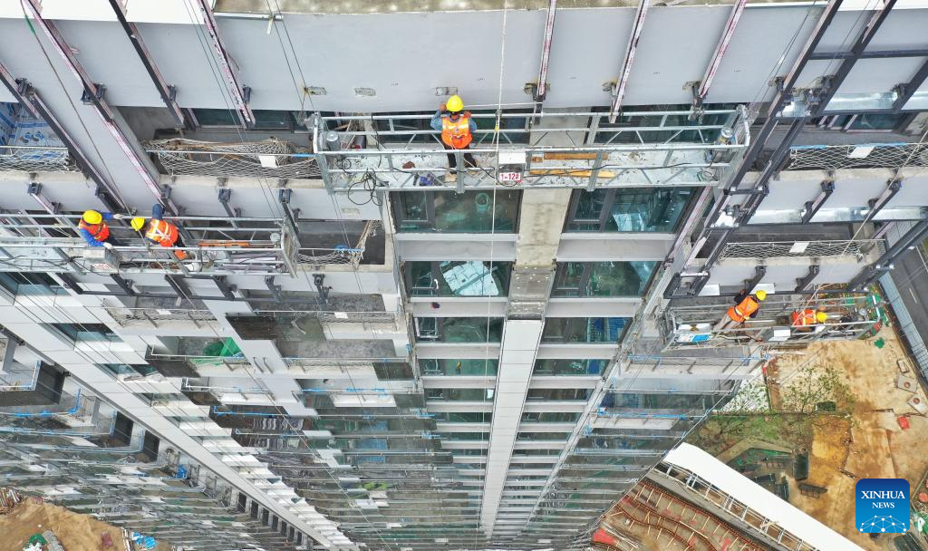 Workers work on construction site during Labor Day holiday in Chengdu