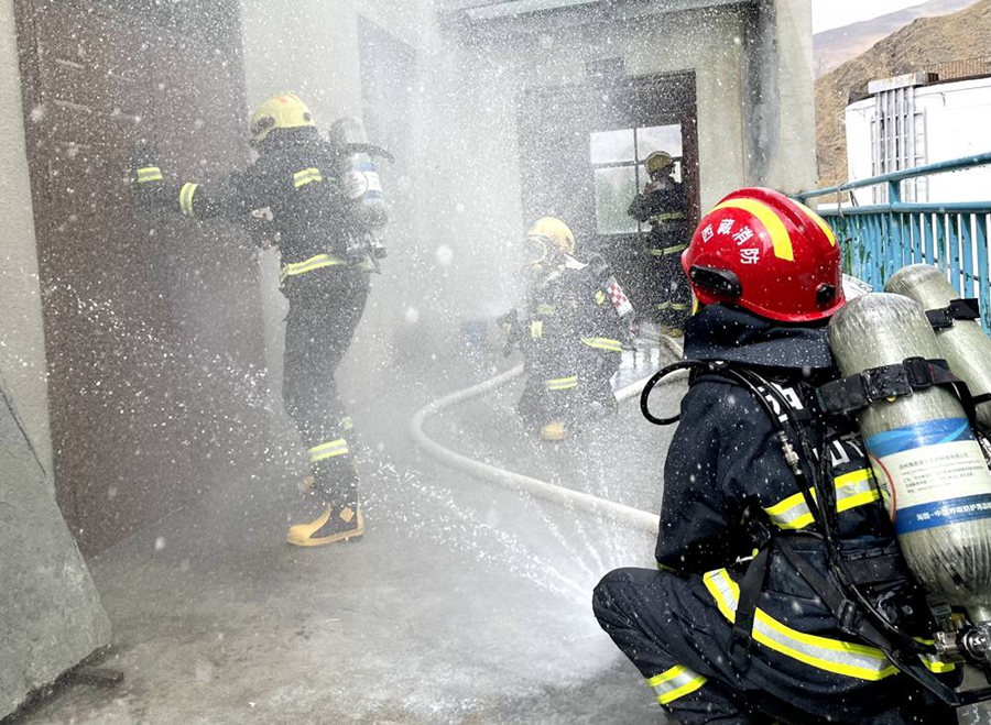 In pics: Firefighter training drills in the flame in SW China's Tibet