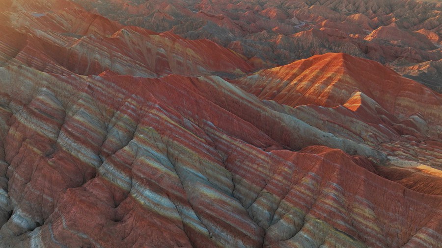 Sneak peek of spectacular Danxia landforms in NW China's Gansu reveals nature's supreme beauty