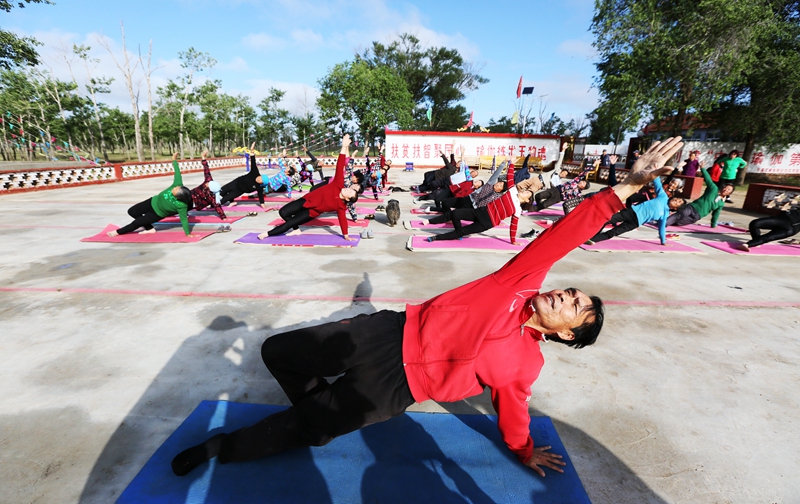 Yoga injects vitality into village in north China’s Hebei Province