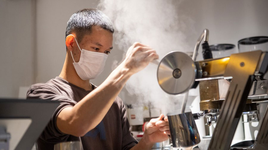 Coffee streams into streets of China's "mountain city"