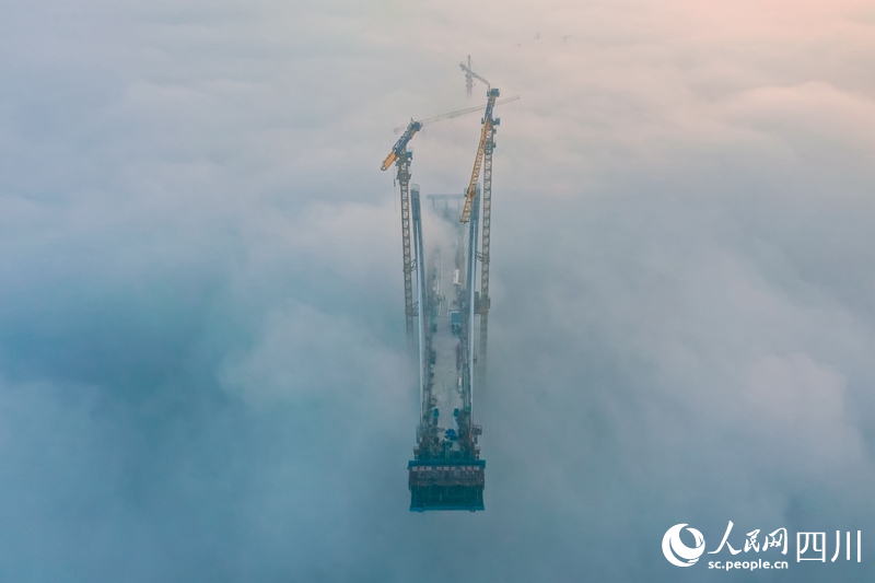 A glimpse into construction of super bridge in the clouds in SW China