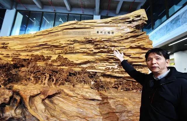 In pics: Wood carving works from China’s Fujian tell China stories to world