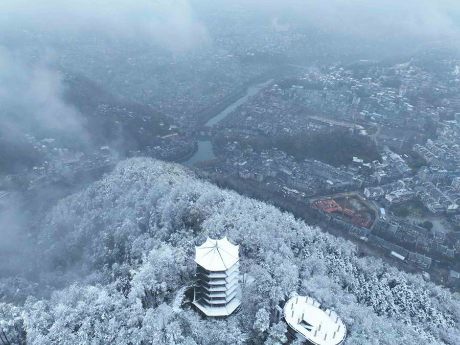 Picturesque snow scenery of Fenghuang ancient town in central China