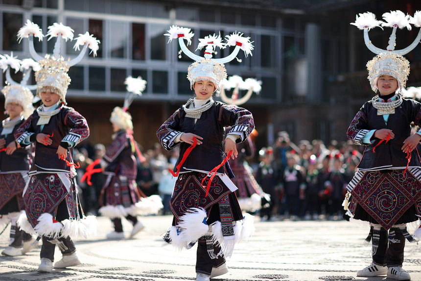 Miao people in SW China's Guizhou celebrate Spring Festival with traditional dances