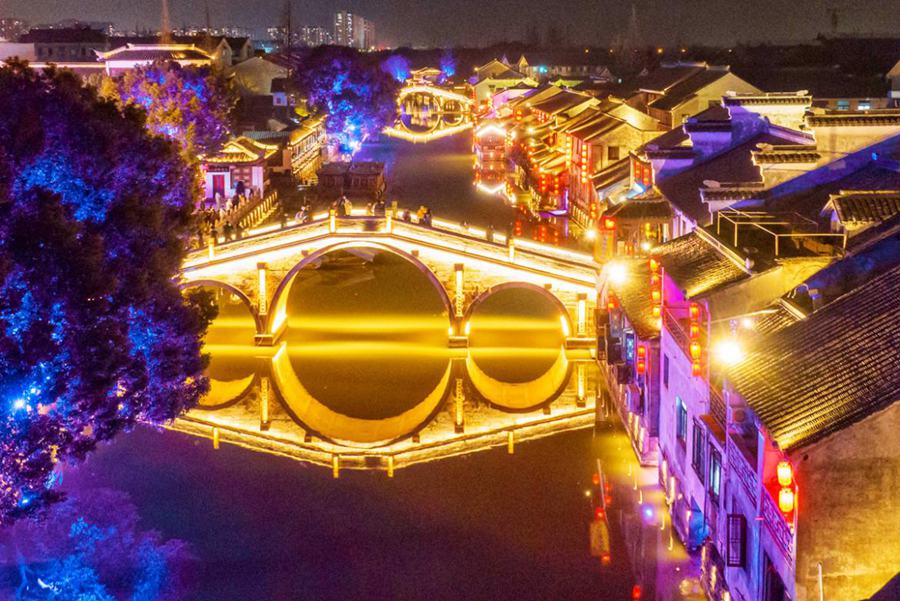 Lighting ceremony attract visitors in ancient town in China’s Jiangsu